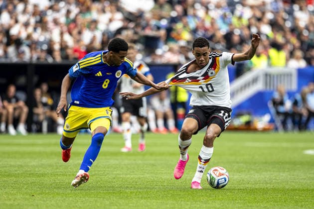 Jamal Musiala of Germany (R) and Livano Comenencia of Curacao (L) fight for possession during the FIFA World Cup, WM, Weltmeisterschaft, Fussball 2026 Group E match between Germany and Curacao at Houston Stadium on June 14th,2026 (Photo by Joao Bravo Sports Press Photo)  Copyright: xJoaoxBravo SportsxPressxPhotox Sportspressphoto_SPR166353