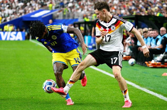 FIFA World Cup, WM, Weltmeisterschaft, Fussball 2026 - Group E - Germany vs Curacao Leandro Bacuna of Curacao (L) and Florian Wirtz of Germany in action during the FIFA World Cup 2026 group stage match Germany against Curacao, in Houston, USA, 14 June 2026. HOUSTON United States  Copyright: xSAMxWASSONx