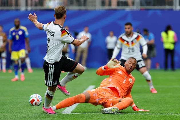 Joshua Kimmich (Germany) und Torhueter Manuel Neuer (Germany) battle for the ball during the FIFA World Cup, WM, Weltmeisterschaft, Fussball 2026 Group E match between Germany and Curacao at Houston Stadium on June 14, 2026 in Houston, United States. (Photo by Torbjorn Tande DeFodi Images) -