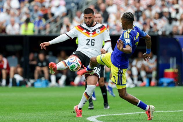 Deniz Undav (Germany) und Juninho Bacuna (Curacao) battle for the ball during the FIFA World Cup, WM, Weltmeisterschaft, Fussball 2026 Group E match between Germany and Curacao at Houston Stadium on June 14, 2026 in Houston, United States. (Photo by Torbjorn Tande DeFodi Images) -