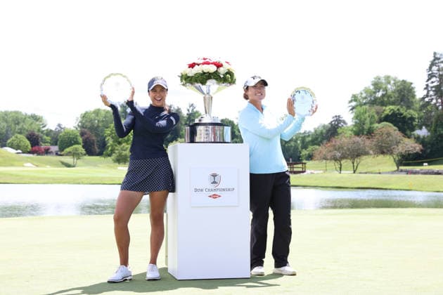 Dow Championship MIDLAND, MICHIGAN - JUNE 14: Yana Wilson (L) and Gina Kim (R) of the United States pose with the winners™ trophy during the final round of the Dow Championship at Midland Country Club in Midland, Michigan, USA on Sunday, June 14, 2026. Midland Michigan United States  Copyright: xJorgexLemusx originalFilename:lemus-dowchamp260614_npK83.jpg