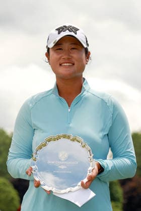 Dow Championship Midland, MI - JUNE 14: Winner Gina Kim of the United States poses with the trophy during the award ceremony at the conclusion of the final round of the Dow Championship at Midland Country Club on June 14, 2026 in Midland, Michigan. Midland Michigan United States  Copyright: xAmyxLemusx originalFilename:lemus-dowchamp260614_npLm7.jpg