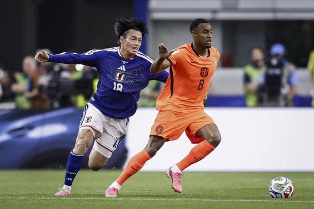 ARLINGTON - (lr) Ayase Ueda of Japan and Ryan Gravenberch of the Netherlands during the FIFA 2026 World Cup Group F match between the Netherlands and Japan at Dallas Stadium on June 14, 2026, in Arlington, United States. ROBIN VAN LONKHUIJSEN ANP FIFA World Cup, WM, Weltmeisterschaft, Fussball 2026 2026 xVIxANPxSportx xxANPxIVx 561020795 originalFilename: 561020795.jpg