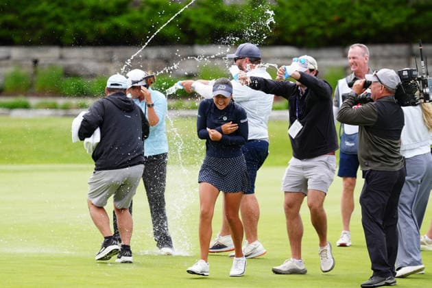 MIDLAND, MI - JUNE 14: LPGA, Golf Damen golfer Yana Wilson gets doused by water from her caddie on June 14, 2026, after winning the LPGA Dow Championship at Midland Country Club in Midland, Michigan. (Photo by Brian Spurlock Icon Sportswire) GOLF: JUN 14 LPGA Dow Championship EDITORIAL USE ONLY Icon26061466