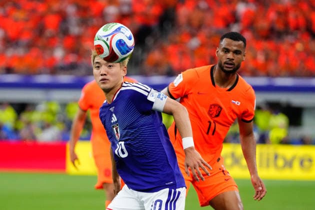 Netherlands v Japan: Group F - FIFA World Cup, WM, Weltmeisterschaft, Fussball 2026 Ritsu Doan of Japan and Cody Gakpo of Netherlands compete for the ball during the FIFA World Cup 2026 Group F match between Netherlands and Japan at Dallas Stadium on June 14, 2026 in Dallas, Texas. Dallas TX United States  Copyright: xJosexBretonx originalFilename:bretonhernandez-netherla260614_npDX7.jpg