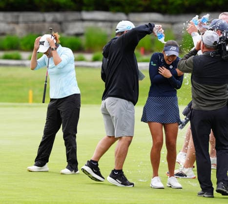 MIDLAND, MI - JUNE 14: LPGA, Golf Damen golfer Yana Wilson is doused with water on the 18th hole on June 14, 2026, after winning the LPGA Dow Championship at Midland Country Club in Midland, Michigan. (Photo by Brian Spurlock Icon Sportswire) GOLF: JUN 14 LPGA Dow Championship EDITORIAL USE ONLY Icon26061477