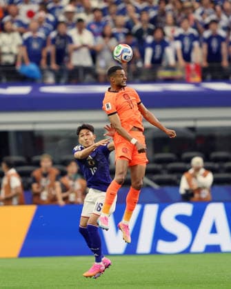 Netherlands v Japan: Group F - FIFA World Cup, WM, Weltmeisterschaft, Fussball 2026 DALLAS, TEXAS - JUNE 14: Tsuyoshi Watanabe of Japan and Cody Gakpo of Netherlands in action during the FIFA World Cup 2026 Group F match between Netherlands and Japan at Dallas Stadium on June 14, 2026 in Dallas, Texas.  SanjinxStrukic PIXSELL
