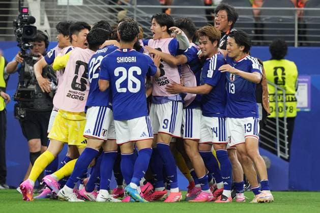 Japan players celebrate the equalising goal to make it 2-2 Netherlands v Japan, 2026 FIFA World Cup, WM, Weltmeisterschaft, Fussball Group F, Football, Dallas Stadium, Arlington, Texas, USA - 14 Jun 2026Arlington Dallas Stadium Texas (TX) United States of America EDITORIAL USE ONLY No use with unauthorised audio, video, data, fixture lists, club league logos or live services. Online in-match use limited to 120 images, no video emulation. No use in betting, games or single club league player publications.  Copyright: xIsmaelxAdnan Shutterstockx 16927680ea