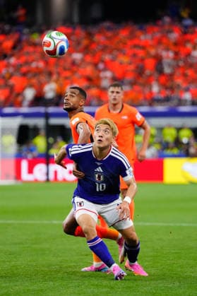 June 14, 2026, Dallas, Texas, United States: Ritsu Doan of Japan and Cody Gakpo of Netherlands compete for the ball during the FIFA World Cup, WM, Weltmeisterschaft, Fussball 2026 Group F match between Netherlands and Japan at Dallas Stadium on June 14, 2026 in Dallas, Texas. Dallas United States - ZUMAa181 20260614_zaa_a181_219 Copyright: xJosexBretonx