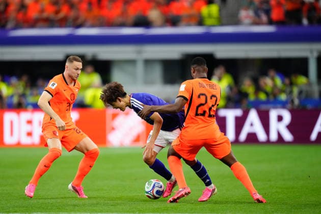 Netherlands v Japan: Group F - FIFA World Cup, WM, Weltmeisterschaft, Fussball 2026 Takefusa Kubo of Japan and Denzel Dumfries of Netherlands compete for the ball during the FIFA World Cup 2026 Group F match between Netherlands and Japan at Dallas Stadium on June 14, 2026 in Dallas, Texas. Dallas TX United States  Copyright: xJosexBretonx originalFilename:bretonhernandez-netherla260614_npFJm.jpg