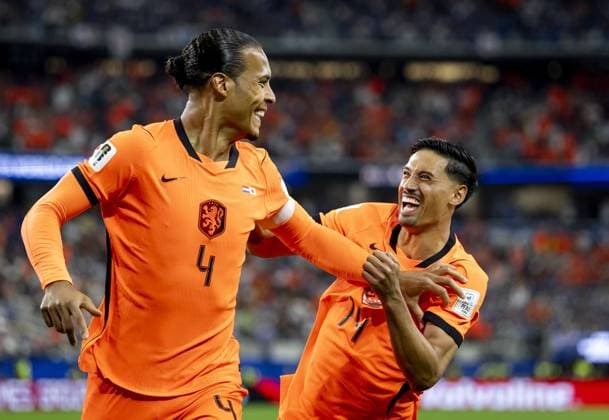 ARLINGTON - (lr) Virgil van Dijk of the Netherlands, Tijjani Reijnders of the Netherlands celebrate the 1-0 during the FIFA 2026 World Cup Group F match between the Netherlands and Japan at Dallas Stadium on June 14, 2026, in Arlington, United States. KOEN VAN WEEL ANP FIFA World Cup, WM, Weltmeisterschaft, Fussball 2026 2026 xVIxANPxSportx xxANPxIVx 561032879 originalFilename: 561032879.jpg