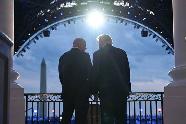 US President Donald Trump hosts UFC Freedom 250 at the White House US President Donald Trump (R) and UFC CEO Dana White (L) stand on the Blue Room Balcony of the White House as US military jets perform a flyover during the UFC Freedom 250 mixed martial arts event in Washington, DC, USA, 14 June 2026. The mixed martial arts event is taking place on the 80th birthday of President Trump. Washington District of Columbia United States  Copyright: xSAULxLOEBx xPOOLx