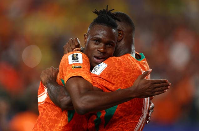 Philadelphia, USA, 14th June 2026. Wilfried Singo (L) of Ivory Coast celebrates with Franck Kessie of Ivory Coast after Amad Diallo (not pictured) of Ivory Coast scores to make it 1-0 during the Ivory Coast vs Ecuador FIFA World Cup, WM, Weltmeisterschaft, Fussball match at Lincoln Financial Field, Philadelphia. Picture credit should read: Paul Terry Sportimage EDITORIAL USE ONLY. No use with unauthorised audio, video, data, fixture lists, club league logos or live services. Online in-match use limited to 120 images, no video emulation. No use in betting, games or single club league player publications. SPI_063_PT_Ivory_Coast_Ecuador SPI-4836-0063