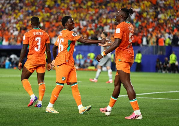Philadelphia, USA, 14th June 2026. Christ Inao Oulai of Ivory Coast and Wilfried Singo of Ivory Coast celebrates after Amad Diallo of Ivory Coast scores to make it 1-0 during the Ivory Coast vs Ecuador FIFA World Cup, WM, Weltmeisterschaft, Fussball match at Lincoln Financial Field, Philadelphia. Picture credit should read: Paul Terry Sportimage EDITORIAL USE ONLY. No use with unauthorised audio, video, data, fixture lists, club league logos or live services. Online in-match use limited to 120 images, no video emulation. No use in betting, games or single club league player publications. SPI_068_PT_Ivory_Coast_Ecuador SPI-4836-0068
