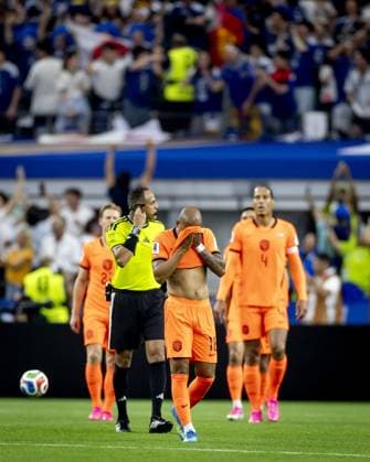 ARLINGTON - Donyell Malen or the Netherlands are disappointed during the FIFA 2026 World Cup Group F match between the Netherlands and Japan at Dallas Stadium on June 14, 2026, in Arlington, United States. KOEN VAN WEEL ANP FIFA World Cup, WM, Weltmeisterschaft, Fussball 2026 2026 xVIxANPxSportx xxANPxIVx 561058363 originalFilename: 561058363.jpg