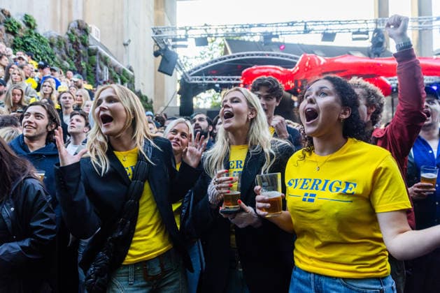 260614 Fans of Sweden follows the FIFA World Cup, WM, Weltmeisterschaft, Fussball between Sweden and Tunisia at a big screen on June 15, 2026 at Trädgarden in Stockholm. Photo: Caisa Rasmussen BILDBYRAN COP 353 CR0052 fotboll football soccer fotball fifa world cup 2026 sweden - tunisia stockholm bbeng publik