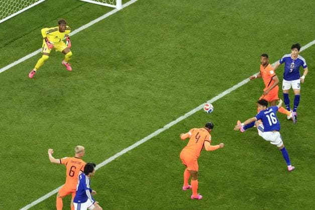 Football: 2026 World Cup Virgil van Dijk (4) of the Netherlands scores the opening goal in the second half of a World Cup Group F football match against Japan at Dallas Stadium in Arlington, Texas, on June 14, 2026.  A14AA0005618782P