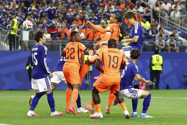 Football: 2026 World Cup Japan s Koki Ogawa (upper R) heads the ball before Daichi Kamada (15) scores the team s second goal in the second half of a World Cup Group F football match against the Netherlands at Dallas Stadium in Arlington, Texas, on June 14, 2026.  A14AA0005618797P