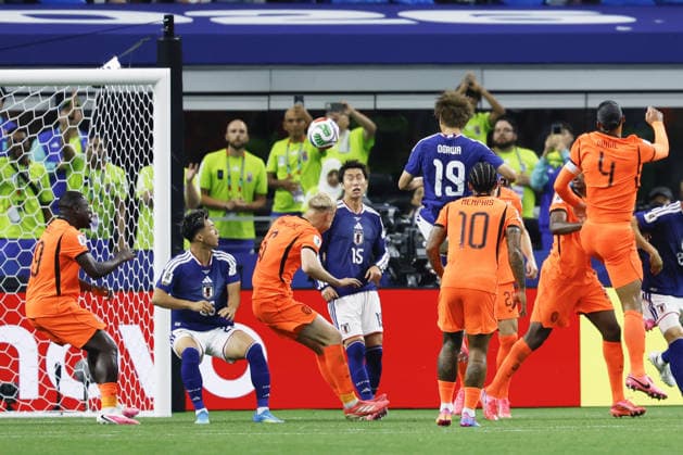 Football: 2026 World Cup Japan s Koki Ogawa (19) heads the ball before Daichi Kamada (15) scores the team s second goal in the second half of a World Cup Group F football match against the Netherlands at Dallas Stadium in Arlington, Texas, on June 14, 2026.  A14AA0005618799P