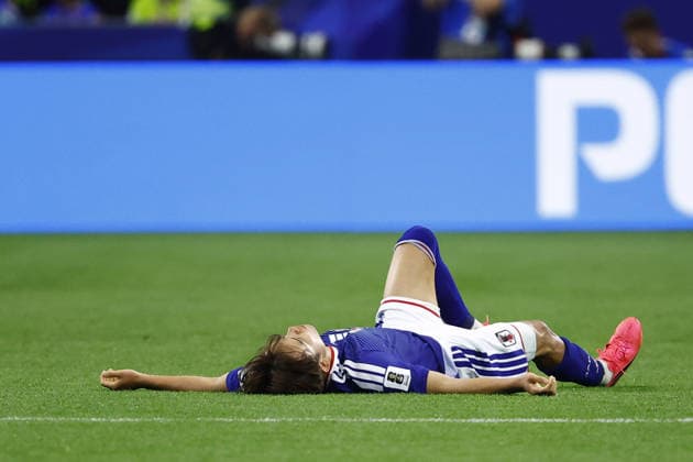 Football: 2026 World Cup Japan s Takefusa Kubo lies on the pitch in the second half of a World Cup Group F football match against the Netherlands at Dallas Stadium in Arlington, Texas, on June 14, 2026.  A14AA0005618824P