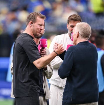 Fussball FIFA WM 2026 Vorrunde Gruppe E in Houston Deutschland - Curacao 14.06.2026 Bundestrainer Julian Nagelsmann (li, Deutschland) mit Shake Hands mit Magenta Moerator Johjanner B. Kerner