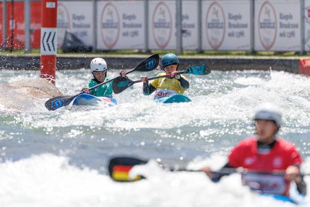 Ricarda Funk (GER), Nikita Setchell (GBR), Chiara Sabattini (ITA), Leire Goni (ESP) bei ICF CANOE SLALOM WORLD CUP, Kanusport, Frauen, Kayak Cross, 2026, am 14.06.2026 in Augsburg, Eiskanal. Bayern Deutschland