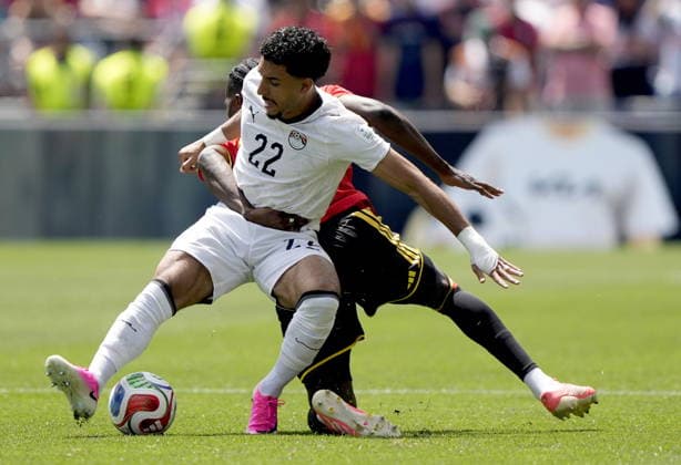 FIFA World Cup, WM, Weltmeisterschaft, Fussball 2026 - Group G - Belgium vs Egypt Amadou Onana of Belgium in action against Omar Marmoush (front) of Egypt during the FIFA World Cup 2026 group stage match Belgium against Egypt, in Seattle, USA, 15 June 2026. SEATTLE United States  Copyright: xSTEPHENxBRASHEARx