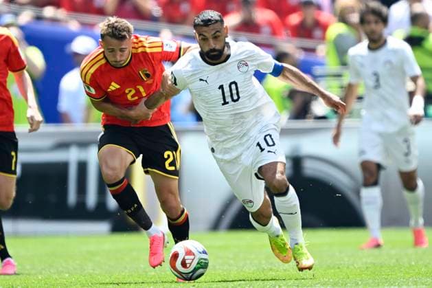 Belgium vs Egypt - 2026 FIFA World Cup, WM, Weltmeisterschaft, Fussball SEATTLE, USA - JUNE 15 : Castagne Timothy defender of Belgium and Salah Mohamed forward of Egypt battle for the ball during the FIFA World Cup 2026 Group G match between Belgium and Egypt at the Lumen Field stadium on June 15, 2026 in Seattle, USA, 15 06 2026 Seattle United States of America  Copyright: xNicoxVereeckenx