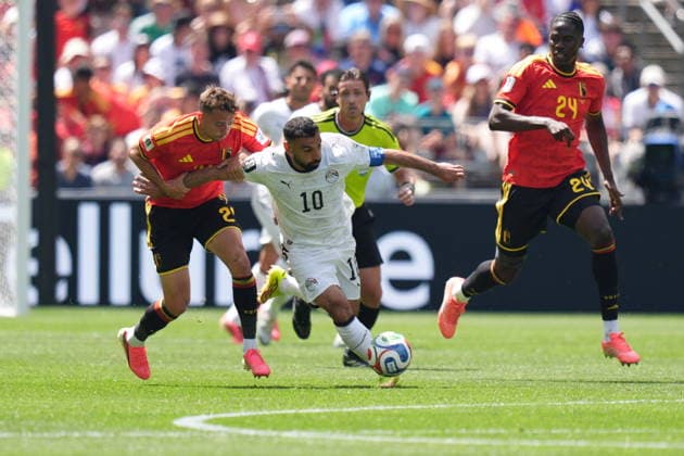 Belgium v Egypt - FIFA World Cup, WM, Weltmeisterschaft, Fussball 2026 - Group G SEATTLE, UNITED STATES - JUNE 15: Mohamed Salah (10) of Egypt in action against Nicolas Raskin (L) of Belgium during the 2026 FIFA World Cup First Stage Group G match between Belgium and Egypt at Lumen Field (Seattle Stadium) in Seattle, Washington, United States on June 15, 2026. Ercin Erturk Anadolu Washington United States. Editorial use only. Please get in touch for any other usage.  Copyright: x2026xAnadoluxErcinxErturkx