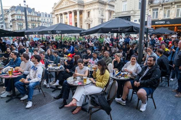 People watch a soccer game between Belgian national team, Nationalteam Red Devils and Egypt, in a cafe in Brussels, on Monday 15 June 2026, the first game in the group stage of the FIFA World Cup, WM, Weltmeisterschaft, Fussball 2026 in the United States of America. The Diables Rouges - Rode Duivels were drawn into Group G. MARIUS BURGELMAN MariusxBurgelman  x177810740x