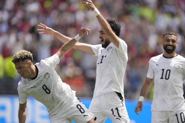 FIFA World Cup, WM, Weltmeisterschaft, Fussball 2026 - Group G - Belgium vs Egypt Emam Ashour (L) of Egypt celebrates with teammates after scoring the opening goal during the FIFA World Cup 2026 group stage match Belgium against Egypt, in Seattle, USA, 15 June 2026. SEATTLE United States  Copyright: xSTEPHENxBRASHEARx