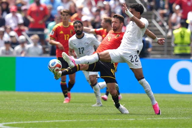 Belgium v Egypt - FIFA World Cup, WM, Weltmeisterschaft, Fussball 2026 - Group G SEATTLE, UNITED STATES - JUNE 15: Omar Marmoush (22) of Egypt in action against Brandon Mechele (4) of Belgium during the 2026 FIFA World Cup First Stage Group G match between Belgium and Egypt at Lumen Field (Seattle Stadium) in Seattle, Washington, United States on June 15, 2026. Ercin Erturk Anadolu Washington United States. Editorial use only. Please get in touch for any other usage.  Copyright: x2026xAnadoluxErcinxErturkx