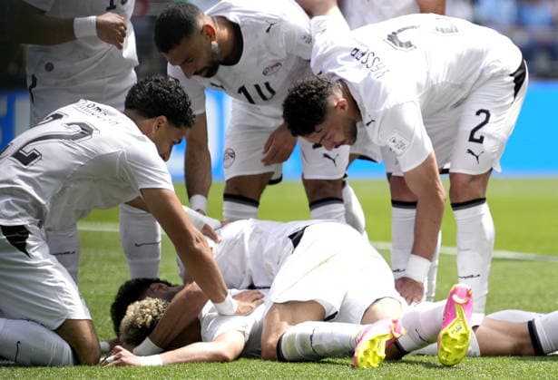 FIFA World Cup, WM, Weltmeisterschaft, Fussball 2026 - Group G - Belgium vs Egypt Emam Ashour (bottom) of Egypt celebrates with teammates after scoring the opening goal during the FIFA World Cup 2026 group stage match Belgium against Egypt, in Seattle, USA, 15 June 2026. SEATTLE United States  Copyright: xSTEPHENxBRASHEARx