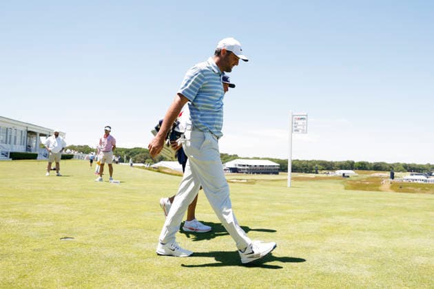 Scottie Scheffler walks to the 14th fairway while playing in a practice round on the Monday before the 126th U.S. Open Golf Championship at Shinnecock Hills Golf Club on Monday, June 15, 2026 in Southampton, New York.  NYP20260615305 JOHNxANGELILLO