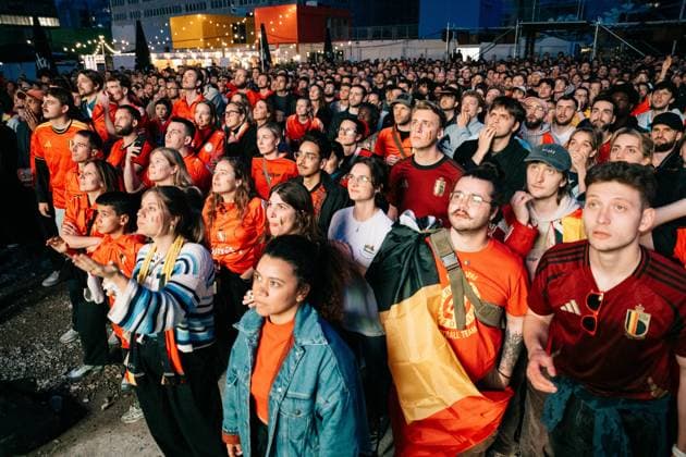 Supporters react during a soccer game between Belgian national team, Nationalteam Red Devils and Egypt, on a big screen in Brussels, on Monday 15 June 2026, the first game in the group stage of the FIFA World Cup, WM, Weltmeisterschaft, Fussball 2026 in the United States of America. The Diables Rouges - Rode Duivels were drawn into Group G. MARIUS BURGELMAN MariusxBurgelman  x177815449x