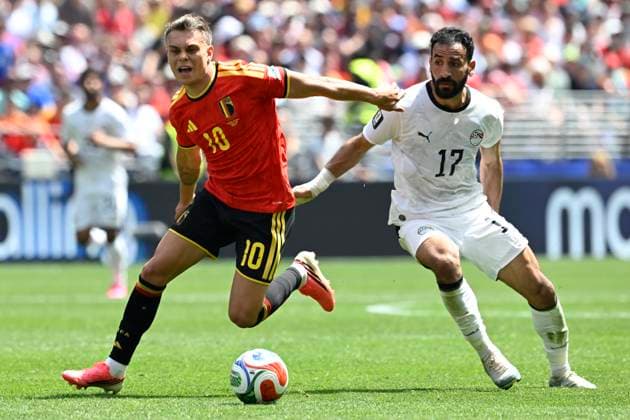 Belgium vs Egypt - 2026 FIFA World Cup, WM, Weltmeisterschaft, Fussball SEATTLE, USA - JUNE 15 : Trossard Leandro forward of Belgium and Lashin Mohanad midfielder of Egypt battle for the ball during the FIFA World Cup 2026 Group G match between Belgium and Egypt at the Lumen Field stadium on June 15, 2026 in Seattle, USA, 15 06 2026 Seattle United States of America  Copyright: xNicoxVereeckenx