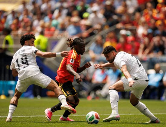 SEATTLE, WASHINGTON - JUNE 15: JÃ rÃ my Doku of Belgium is tackled by Marwan Attia (left) and Yasser Ibrahim of Egypt during the FIFA World Cup, WM, Weltmeisterschaft, Fussball 2026 Group G match between Belgium and Egypt at Seattle Stadium on June 15, 2026 in Seattle, Washington.  Copyright: xMBxMediax