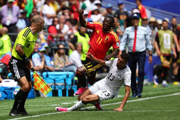 Jeremy Doku of Belgium is tackled by Ahmed Fatouh of Egypt during the FIFA World Cup, WM, Weltmeisterschaft, Fussball 2026 match between Belgium and Egypt at Lumen Field, Seattle, USA on 15 June 2026. Copyright: xPeterxDovganx 45070045