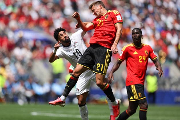 SEATTLE, WA - JUNE 15: Defender Timothy Castagne 21 of Belgium and midfielder Marawan Attia 19 of Egypt jump for the ball during the FIFA World Cup, WM, Weltmeisterschaft, Fussball 2026 Group G match between Belgium and Egypt on June 15, 2026 at Seattle Stadium in Seattle, Washington. (Photo by Henry Rodenburg Icon Sportswire) SOCCER: JUN 15 FIFA World Cup 26 Group G - Belgium vs Egypt EDITORIAL USE ONLY Icon260615029