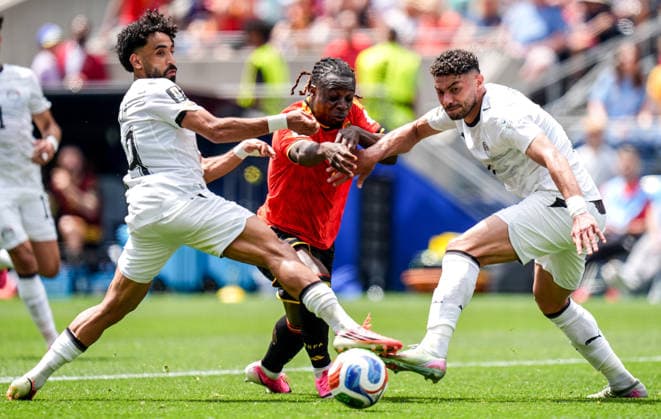 Belgium v Egypt - FIFA World Cup, WM, Weltmeisterschaft, Fussball 2026 - Group G SEATTLE, UNITED STATES - JUNE 14: Belgium s Jeremy Doku (C) challenges an Egypt player during the 2026 FIFA World Cup Group G match between Belgium and Egypt at Lumen Field in Seattle, Washington, United States, on June 14, 2026. Ercin Erturk Anadolu Washington United States. Editorial use only. Please get in touch for any other usage.  Copyright: x2026xAnadoluxErcinxErturkx