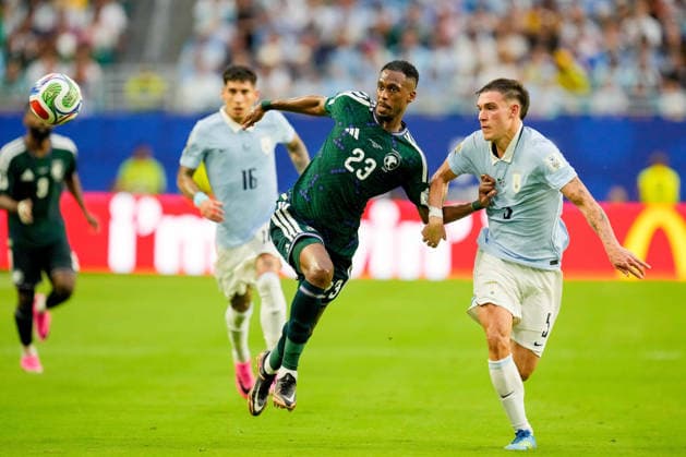 Mohamed Kanno (Saudi Arabia) und Manuel Ugarte (Uruguay) battle for the ball during the FIFA World Cup, WM, Weltmeisterschaft, Fussball 2026 Group H match between Saudi Arabia and Uruguay at Miami Stadium on June 15, 2026 in Miami, United States. (Photo by Alex Gottschalk DeFodi Images) -