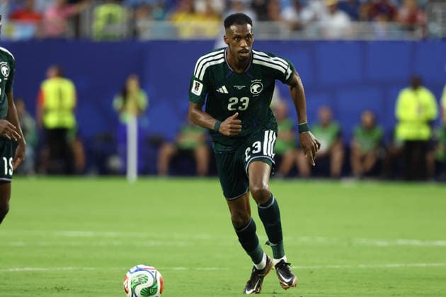 MIAMI GARDENS, FL - JUNE 15: Saudi Arabia midfielder Mohamed Kanno (23) prepares the send the ball forward int he second half during the FIFA World Cup, WM, Weltmeisterschaft, Fussball 2026 Group H match between Saudi Arabia and Uruguay on Monday, June 16, 2026 at Miami Stadium in Miami Gardens, FL (Photo by Peter Joneleit Icon Sportswire) SOCCER: JUN 15 FIFA World Cup 26 Group H - Saudi Arabia vs Uruguay EDITORIAL USE ONLY Icon260615038