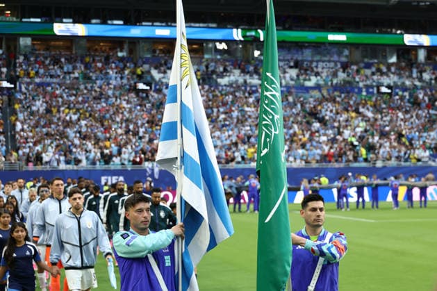 MIAMI GARDENS, FL - JUNE 15: Uruguay and Saudi Arabia flags are carried onto the field for pregame before the FIFA World Cup, WM, Weltmeisterschaft, Fussball 2026 Group H match between Saudi Arabia and Uruguay on Monday, June 16, 2026 at Miami Stadium in Miami Gardens, FL (Photo by Peter Joneleit Icon Sportswire) SOCCER: JUN 15 FIFA World Cup 26 Group H - Saudi Arabia vs Uruguay EDITORIAL USE ONLY Icon260615061