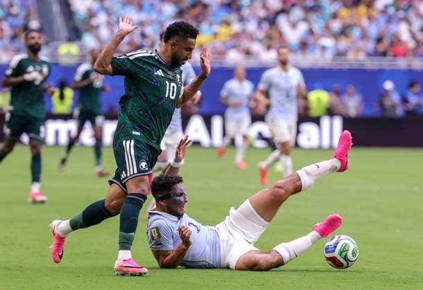 FIFA World Cup, WM, Weltmeisterschaft, Fussball 2026 - Group H - Saudi Arabia vs Uruguay Saudi Arabia midfielder Salem Al Dawsari (L) in action against Uruguay defender Sebastian Caceres during the FIFA World Cup 2026 group stage match Saudi Arabia against Uruguay, in Miami, Florida, USA, 15 June 2026. MIAMI United States  Copyright: xCRISTOBALxHERRERA-ULASHKEVICHx