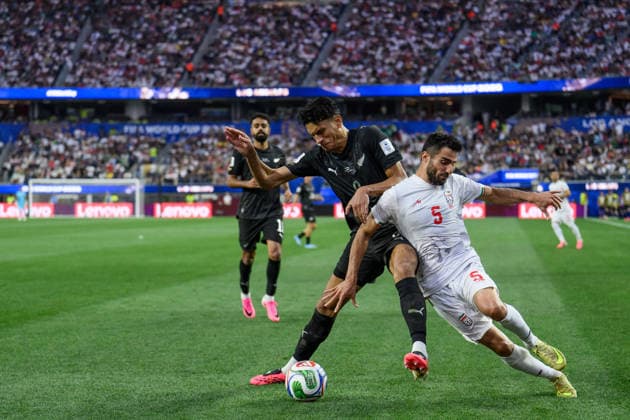 260615 Marko Stamenic of New Zealand and Milad Mohammadi of Iran during the FIFA World Cup, WM, Weltmeisterschaft, Fussball 2026 football match between Iran and New Zealand on June 15, 2026 in Los Angeles. Photo: Joel Marklund BILDBYRAN kod JM JM0824 bbeng fotboll football soccer fotball vm fotbolls-vm fotball-vm fotbolls-vm 2026 fifa world cup 2026 iran nya zeeland new zealand