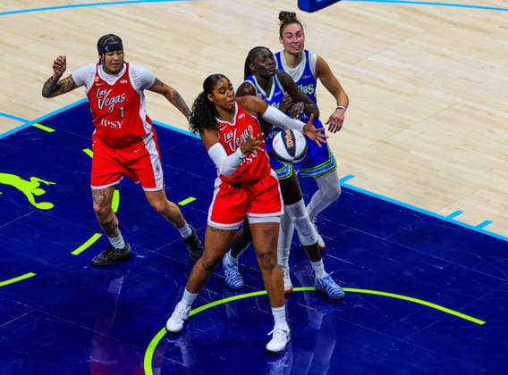 June 15, 2026, Arlington, Texas, USA: ARLINGTON, TX : Las Vegas Aces forward Cheyenne Parker-Tyus (32), Dallas Wings forward Awak Kuier (34) Las Vegas Aces forward Kierstan Bell (1) and Dallas Wings forward Alysha Clark (32) eye the ball under the net during their Commissioner CupÃ¢â‚¬â ¢s game at College Park Center in Arlington on Wednesday night. Arlington USA - ZUMAm257 20260615_zsp_m257_006 Copyright: xBrianxMcLeanx