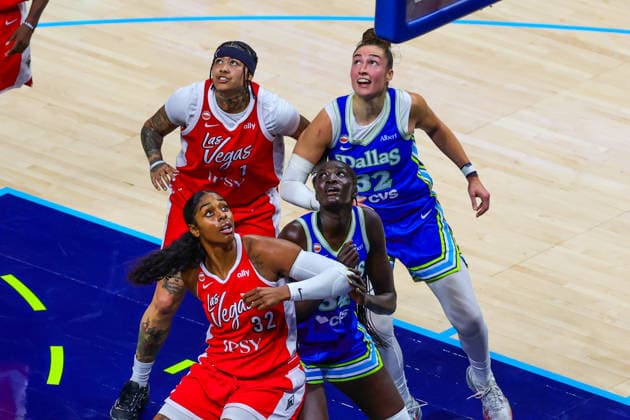 June 15, 2026, Arlington, Texas, USA: ARLINGTON, TX : Las Vegas Aces forward Cheyenne Parker-Tyus (32), Dallas Wings forward Awak Kuier (34) Las Vegas Aces forward Kierstan Bell (1) and Dallas Wings forward Alysha Clark (32) eye the ball under the net during their Commissioner CupÃ¢â‚¬â ¢s game at College Park Center in Arlington on Wednesday night. Arlington USA - ZUMAm257 20260615_zsp_m257_048 Copyright: xBrianxMcLeanx