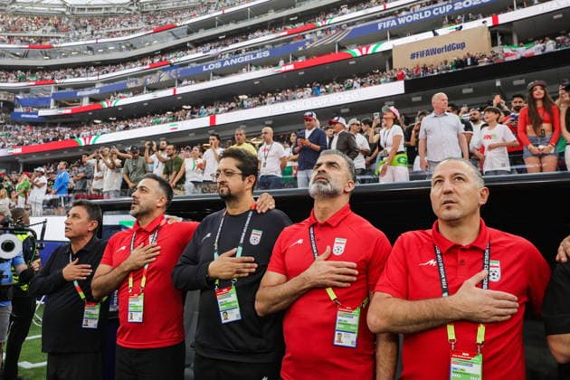FIFA World Cup, WM, Weltmeisterschaft, Fussball 2026 - Group G - Iran vs New Zealand The coaching staff of the Islamic Republic of Iran during the national anthem prior to the FIFA World Cup 2026 group stage match Iran against New Zealand, in Los Angeles, California, USA, 15 June 2026. LOS ANGELES United States  Copyright: xCHRISxTORRESx