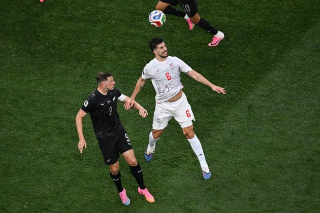 Saeid Ezatolahi of IR Iran and Chris Wood (captain) of New Zealand, New Zealand All Whites v IR Iran, Group G football match of the FIFA World Cup, WM, Weltmeisterschaft, Fussball 2026 at Los Angeles Stadium, Los Angeles, USA on Monday 15 June 2026. Photo: Andrew Cornaga Los Angeles New Zealand Copyright: xAndrewxCornaga x
