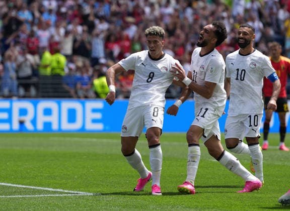 (260616) -- SEATTLE, June 16, 2026 -- Emam Ashour (L) of Egypt celebrates his score during the group G match between Belgium and Egypt at the 2026 FIFA World Cup, WM, Weltmeisterschaft, Fussball at Seattle Stadium in Seattle, the United States, June 15, 2026. ) (SP)U.S.-SEATTLE-FOOTBALL-FIFA WORLD CUP-GROUP G-BEL VS EGY PengxZiyang 